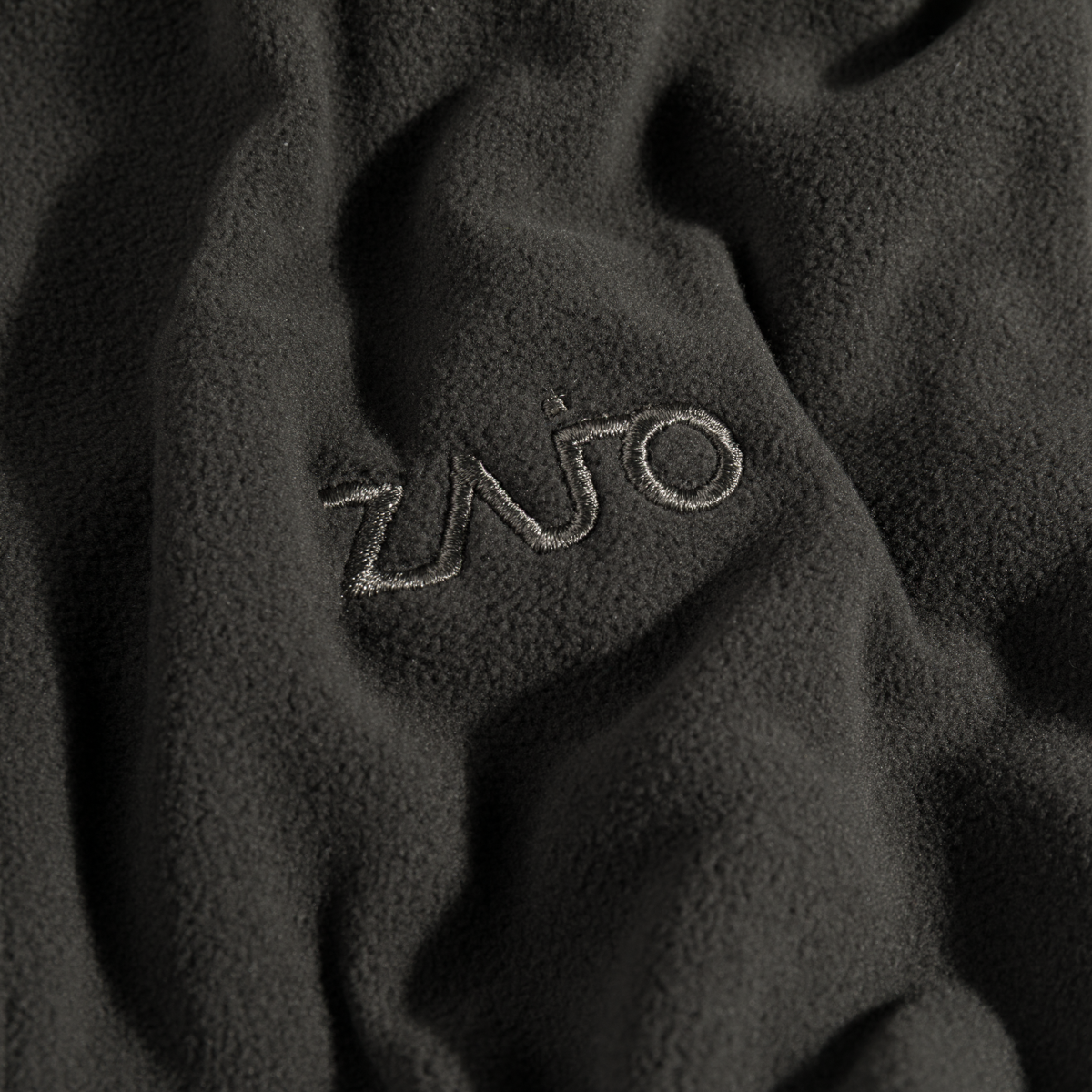 Auro, haut polaire zippé pour femme, coloris Black Olive