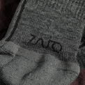 Hejma, chaussettes mi-hautes en laine mérinos, coloris Decadent Red